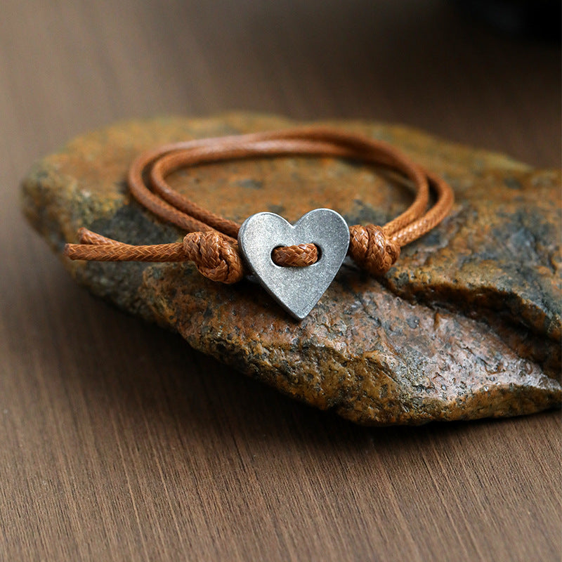 Handgemaakte armband met hartsymbool